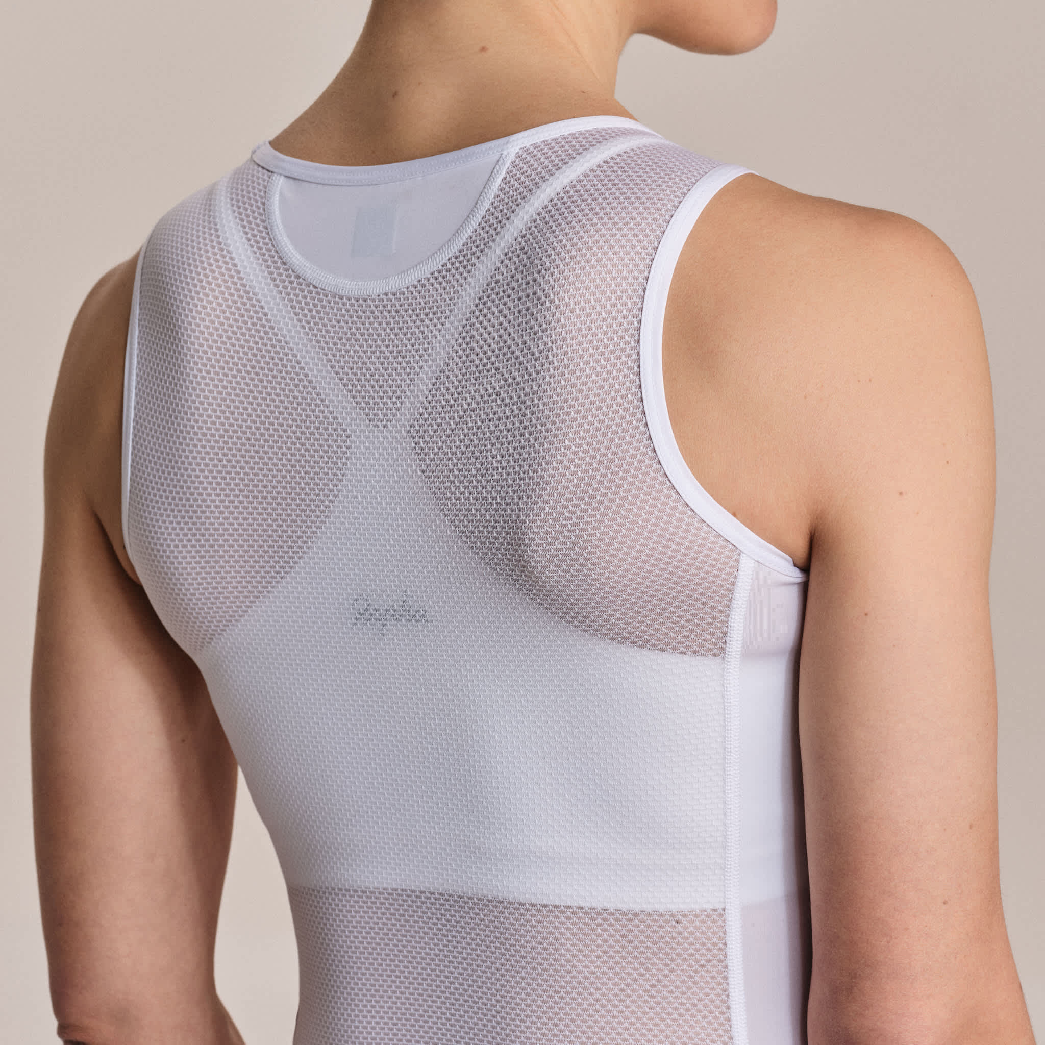 ウィメンズ プロチーム スリーブレス レース ベースレイヤー | Rapha